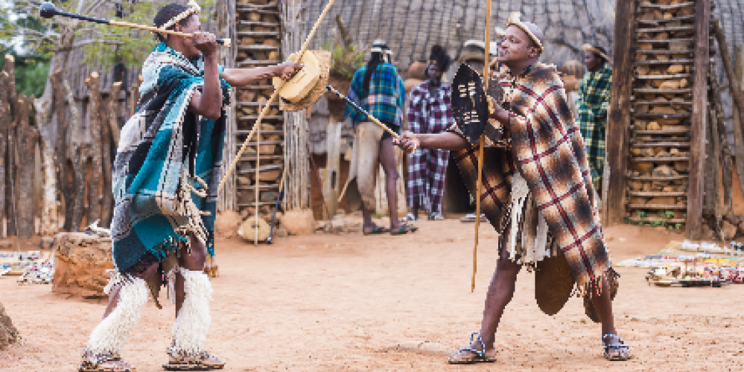 Zulu men give an example of stick fighting at Shakaland, KwaZulu