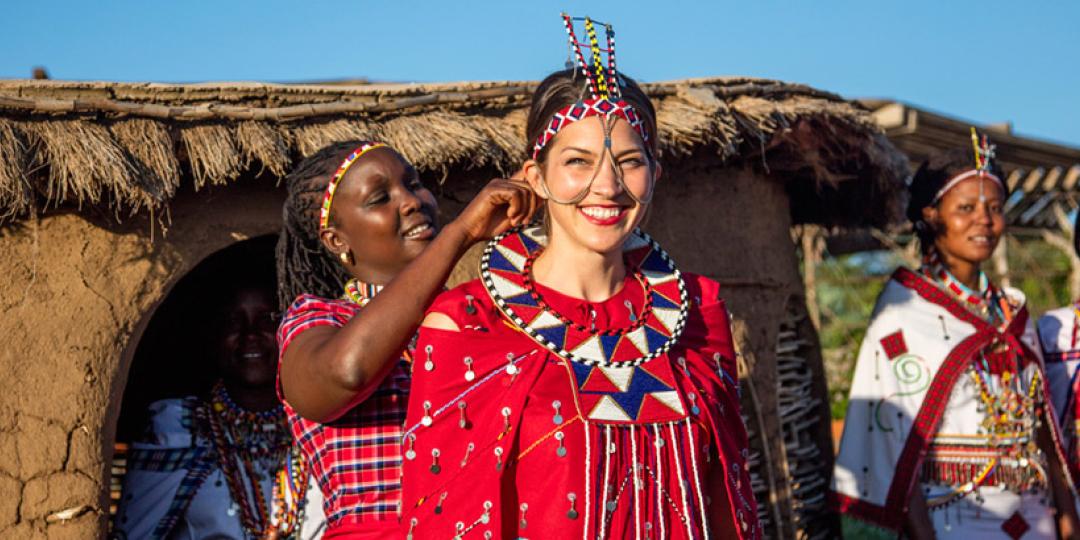 Maasai blessing and presentation of a yarmulke beaded by local women. Image credit: Angama.