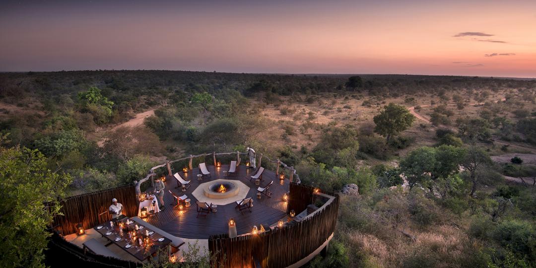The typical safari bush dinner is a popular experience among millennials.