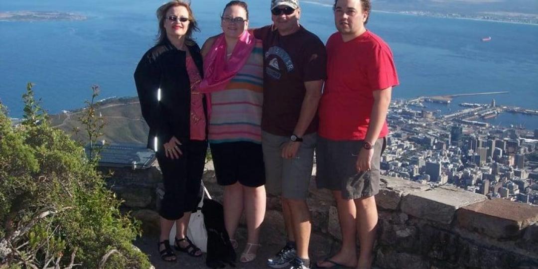 Tourists pictured on Table Mountain as part of a Melberry African Tours excursion.